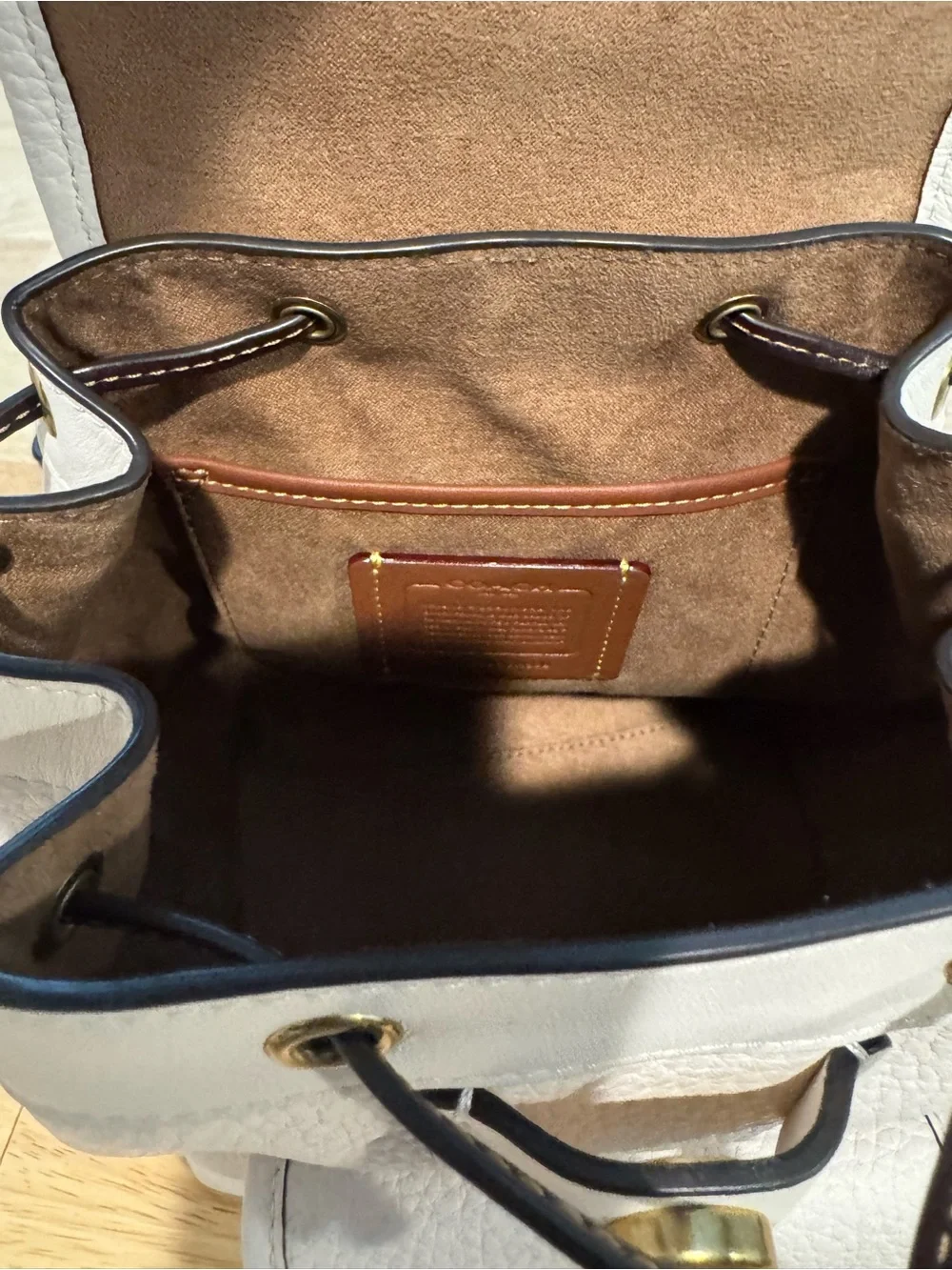 Coach Chalk Pebble Leather Mini Backpack with Black Trim